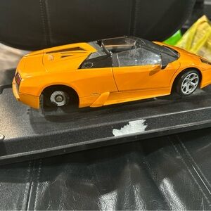 Jada Lamborghini Orange  Toy Car missing a tire